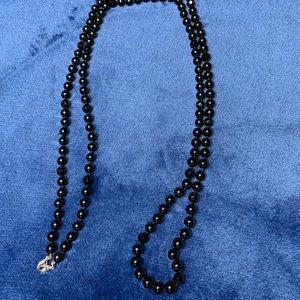 Long black necklace